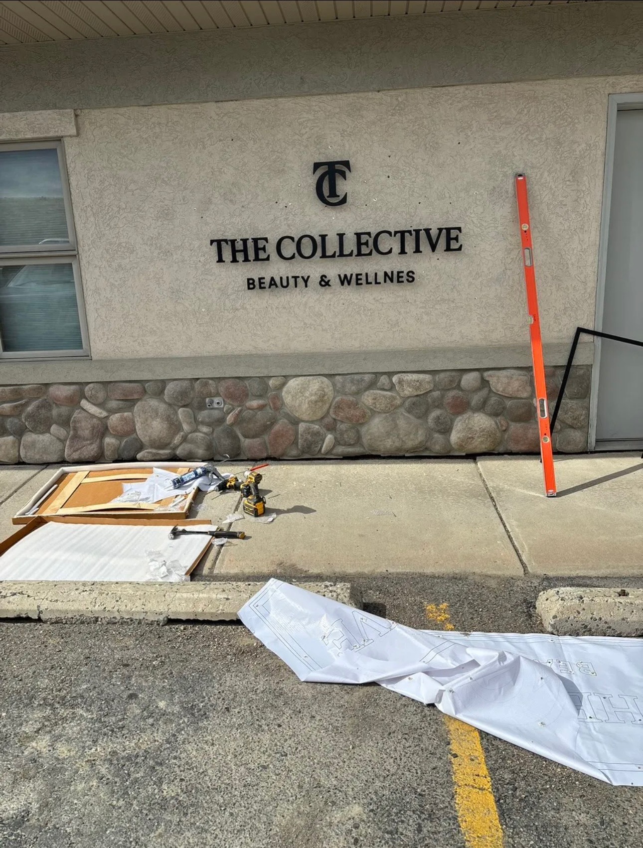 Storefront Sign Install — before